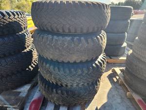 Lot of (4) Specialty Tires Of America Superlug 9.00-16LT Skid Loader Tires with 8-lug Rims