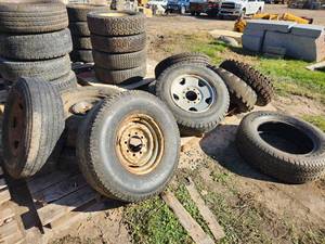 Lot of (9) Skid Loader Tires with 8-lug Rims (on most)