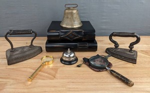 lot 171 image: Wonderful Assortment Antique Brass Bell, Vintage Flat Irons, Magnifying Glasses, & More D