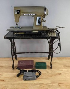 lot 27 image: Vintage Kenmore Sewing Machine with Cast Iron Table D