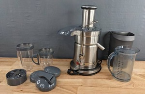 lot 212 image: Breville Juice Fountain Elite and More Juicing Accessories D