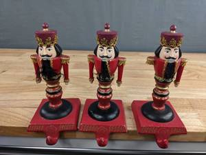 lot 239A image: Set of (3) Nutcracker Christmas Stocking Holders D