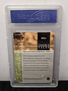 lot 53A image: WCG Graded 10 Tiger Woods 2001 Upper Deck Golf Rookie Tigers Tales Card #TT22 V