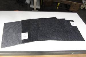 lot 12 image: Set of 4 Trueliving 18 in x 24 in Ribbed Door Matt