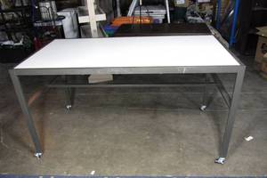 lot 20 image: 38 x 72 x 36 Retail Display Table with Lockable Wheels