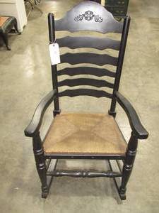 lot 68 image: Antique Early American Ladder Back Rush Seated Black Rocking Chair