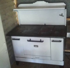 lot 269 image: Vintage South Bend Wood Burning Stove.