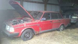 lot 270A image: Volvo 240 4 Door Sedan. Runs and Drives.