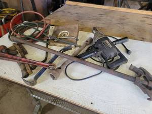 lot 189 image: 24 Pipe Wrench, Conduit Bender, 12 Reversable Drill (Works), Wonder Bar and More