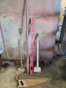 lot 194 image: Solid Steel Prybar, Saws, 48 Aluminum Level, Maul and More