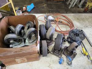 lot 272 image: (10) 4 Swivel Caster Wheels, Assorted 6 Caster Wheels, Spool of 14awg Wire, Trouble Light and More
