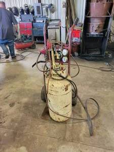 lot 142 image: Torch Cart with Welding Torch, Cutting Torch, Gauges, Propane Tank and More