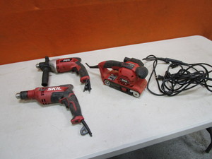 lot 146 image: Skill 12 Drill, 12 Hammer Drill, Sander (Needs Chords Fixed)