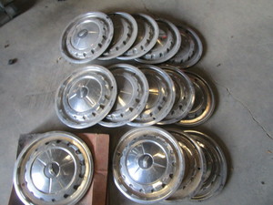 lot 214 image: 57 Chevy Hubcaps