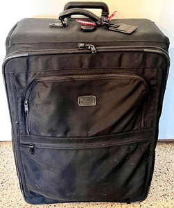 lot 227 image: 3 pieces of Luggage with  Handles and Wheels by TUMI, ATLANTIC, and WILSON LEATHER