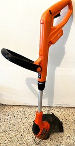 lot 239 image: BLACK  DECKER Cordless Lawn Mower, String Trimmer, Edger, 3 - in - 1 12 with Extra Battery