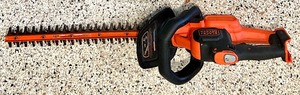 lot 241 image: BLACK  DECKER Cordless Hedge Trimmer and POULAN Chainsaw