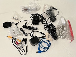 lot 275 image: Bin of Electrical Cords from COMCAST, Remote Controls and more