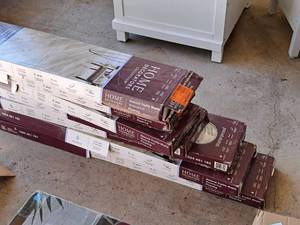 lot 1483 image: Lot of (7 Boxes) Decorators Collection Maple Almond Truffle Waterproof Flooring 20.8-sq.ft.