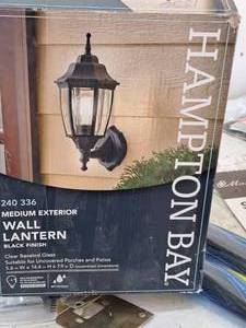 lot 1536 image: Hampton Bay BlackClear Beveled Glass Medium Exterior Wall Lantern (in original box)