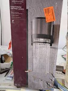 lot 1549 image: Home Decorators Collection Majestic BlackClear Crackle Glass Shade Large Exterior LED Wall Lantern (in original box)