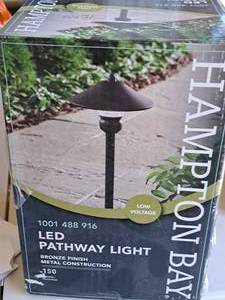 lot 1557 image: Hampton Bay Bronze LED Pathway Lights (in original box)