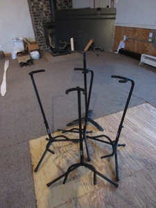 lot 228 image: ON STAGE GUITAR STANDS, SHEET MUSIC STAND AND WALL MOUNT GUITAR  HOLDERS
