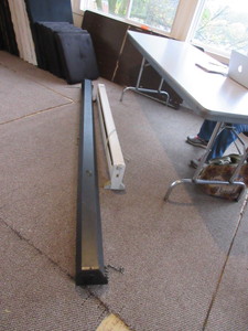lot 256 image: WALL MOUNT MOVIE SCREEN, BASEBOARD HEATER AND FOLDING TABLES