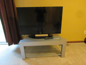 lot 258 image: WESTINGHOUSE TV WITH REMOTE AND SILVER STAND