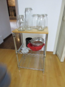 lot 327 image: KICHEN CART, CANISTERS AND STRAINERS