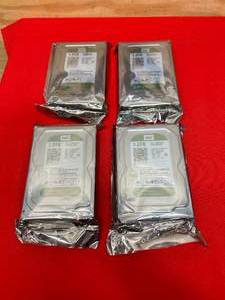 lot 133 image: WESTERN DIGITAL Lot of 4- 1TB Hard Drives