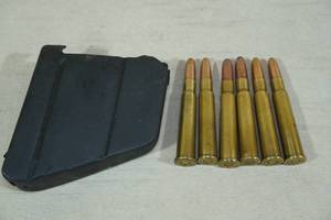 lot 43 image: Lee Enfield Magazine with 6 .303 British Rounds