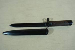 lot 75 image: Reproduction Carcano Folding Bayonet with Scabbard