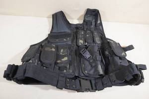 lot 99 image: Scheels Tactical Vest with Holster -XXL