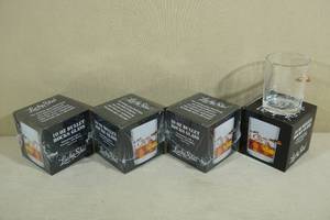 lot 264 image: 4 Lucky Shot Whiskey Glasses with Embedded Bullet