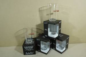lot 266 image: 4 Lucky Shot Pint Glasses with Embedded Bullet