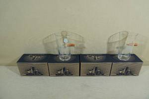 lot 267 image: 4 Lucky Shot Pint Glasses with Embedded Bullet