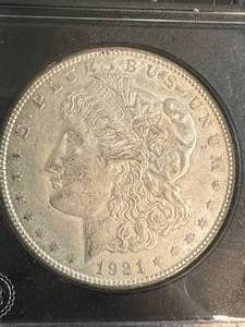 1921 US MORGAN SILVER DOLLAR IN BLACK SLAB