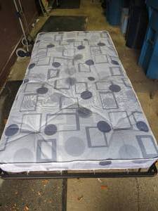 New - Folding Twin Bed
