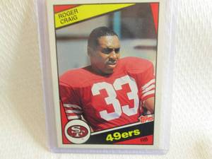 lot 63 image: 1984 Topps Roger Craig Rookie Card...