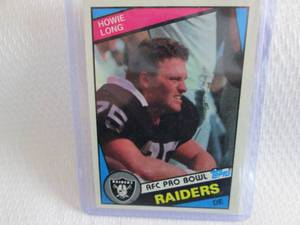 lot 105 image: 1984 Topps Howie Long Rookie Card...