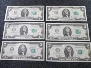 lot 497 image: 6 Uncirculated Sequential $2 Bills...