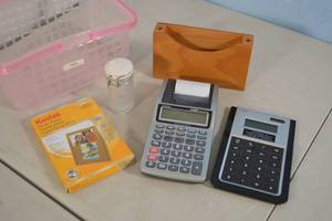 lot 59 image: Assorted Lot - Kodak Photo Paper, Calculators, plastic bottle, etc.