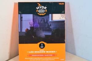 lot 109 image: Hyde and Eek Halloween LED Cool White Ghost Shadow Maker Special Effects Light IndoorOutdoor