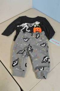 lot 185 image: Cat & Jack Dinosaur Bones Halloween Toddler Pajama Set 12M