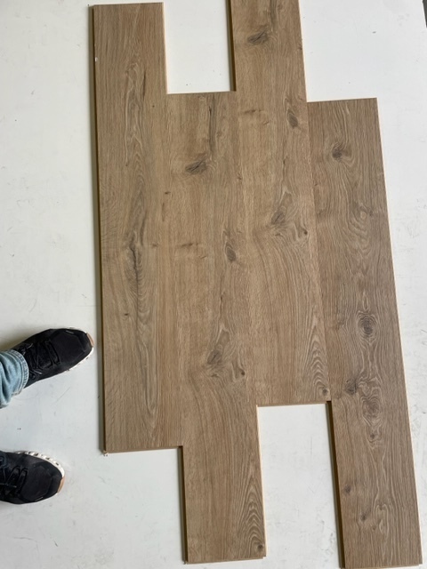 lot 106 image: 397 SF of Water Resistant Easy Install Laminate Flooring -7.5 x47 x 8mm - O