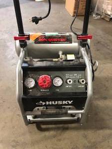 lot 14 image: Husky 4.5 Gal. Portable Electric-Powered Silent Air Compressor  Customer Returns See Pictures
