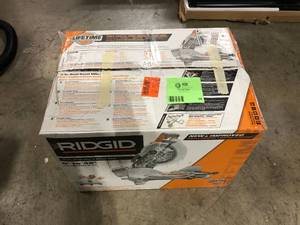 lot 38 image: RIDGID 15 Amp 10 in. Corded Dual Bevel Miter Saw with LED Cut Line Indicator   Customer Returns See Pictures