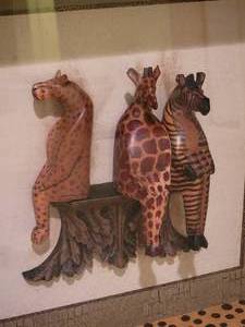 lot 37 image: John-Richard Carved Africian Animal Shadowbox