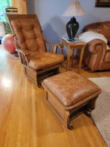 lot 6A image: Distressed Tufted Leather Glider Chair and Ottoman